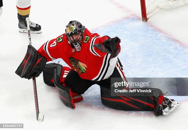 Corey Crawford of the Chicago Blackhawks makes the second period save against the Vegas Golden Knights in Game Four of the Western Conference First...