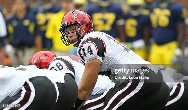 Ryan Lindley of San Diego State cals the play at the line of scrimmage during the third quarter of the game against the Michigan Wolverines at...