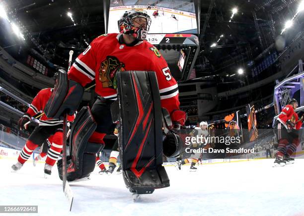 Goaltender Corey Crawford of the Chicago Blackhawks watches the play behind the net against the Vegas Golden Knights during the second period of Game...
