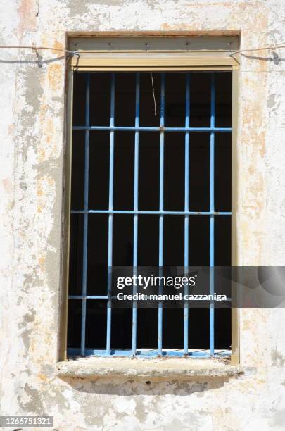 abandoned prison at asinara island - prison window stock pictures, royalty-free photos & images