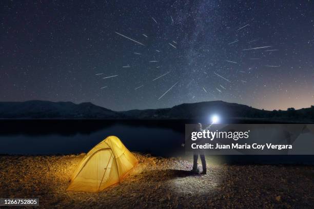 sleeping under the perseids - talave swamp - hellín, lietor (albacete, spain) - meteor shower stock pictures, royalty-free photos & images