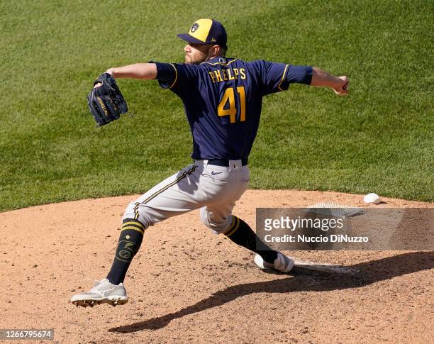 David Phelps of the Milwaukee Brewers throws a pitch during the eighth inning of a game against the Chicago Cubs at Wrigley Field on August 16, 2020...