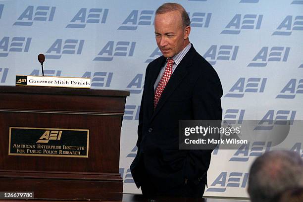 Indiana Gov. Mitch Daniels walks to the podium to speak about his new book "Keeping the Republic" during a discussion at the American Enterprise...