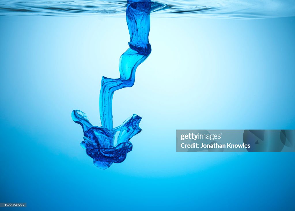 Blue liquid underwater