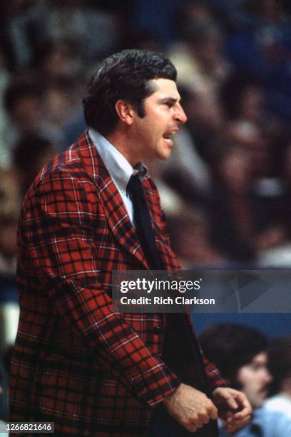 Head coach Bob Knight of the Indiana Hoosiers instructs his players against the UCLA Bruins on November 29, 1975 in St. Louis, MO.