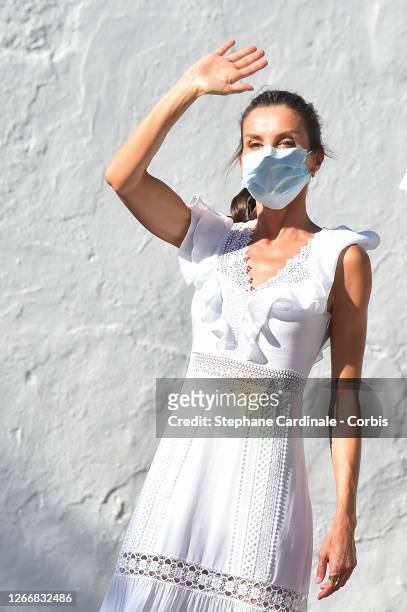 Queen Letizia of Spain is seen visiting the town of Sant Antoni de Portmany , tour of the promenade and streets of the second most populated...