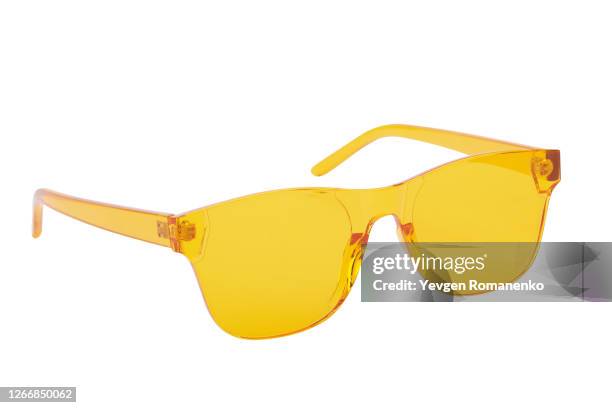 yellow sunglasses isolated on a white background - sunglasses isolated stockfoto's en -beelden