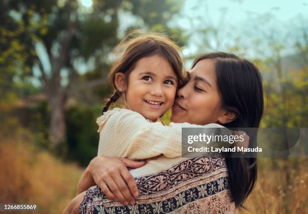 mother daughter love hug - family filipino stock pictures, royalty-free photos & images