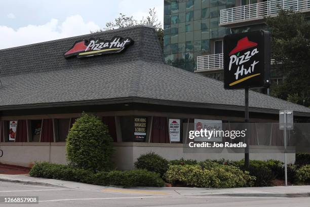 Pizza Hut restaurant is seen on August 17, 2020 in Miami, Florida. NPC International announced it had reached an agreement with Yum! Brands, the...