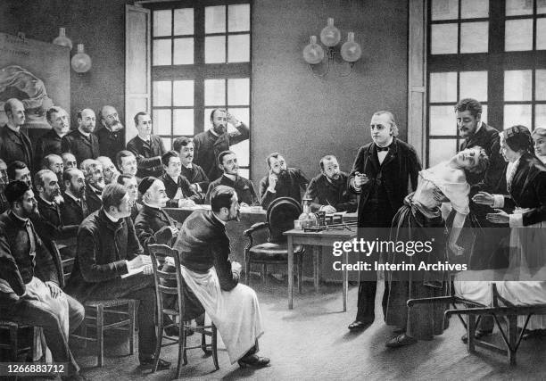 French neurologist Jean-Martin Charcot , fourth from right, during a classroom demonstration with a patient diagnosed with hysteria at the...