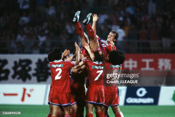 Zico of Kashima Antlers is tossed into the air after he played his final home game of his career following the J.League Suntory Series match between...