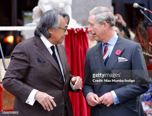 Prince Charles, Prince of Wales talks with David Tang as he visits the Chinatown district on November 1, 2007 in London, England.