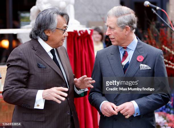 Prince Charles, Prince of Wales talks with David Tang as he visits the Chinatown district on November 1, 2007 in London, England.