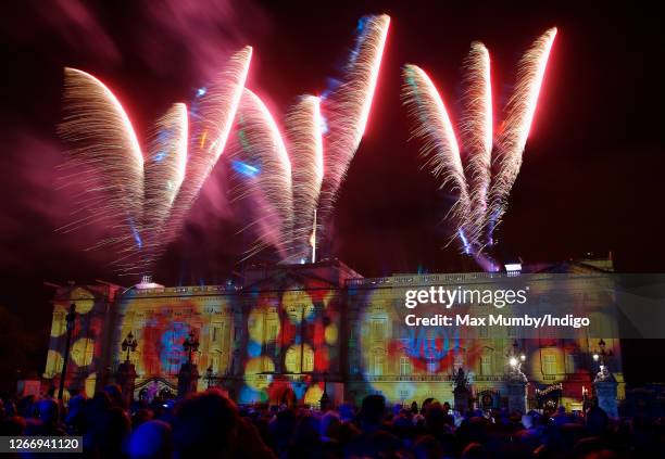 Light show seen projected onto the facade of Buckingham Palace, along with a firework display, to mark the Golden Jubilee of Queen Elizabeth II on...