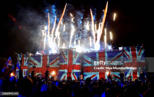 Union Flags seen projected onto the facade of Buckingham Palace, along with a firework display, to mark the Golden Jubilee of Queen Elizabeth II on...