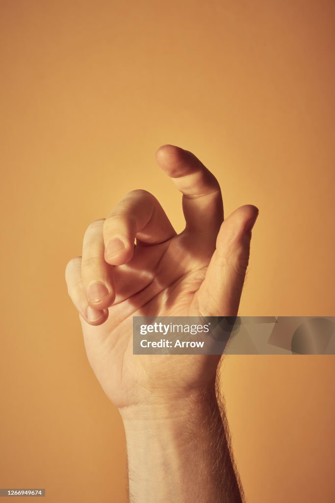 Young Man On Yellow Background