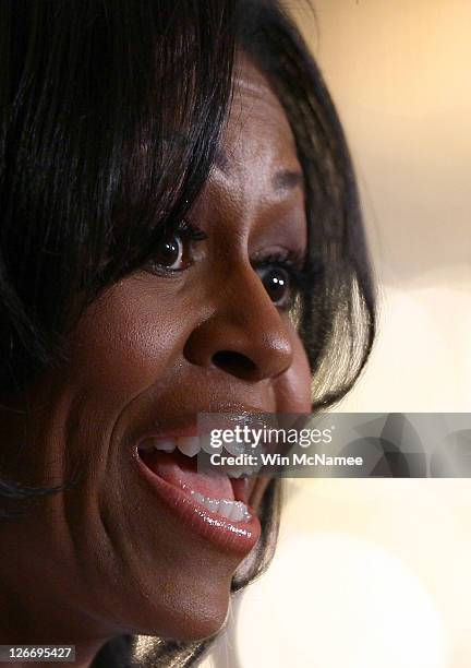 First lady Michele Obama speaks at a White House event on the importance of supporting and retaining women and girls in science, technology,...