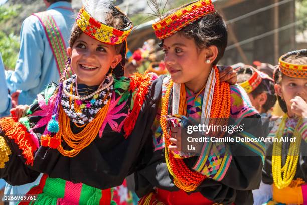 During Chilam Jusht, the spring festival of Kalash people, women and girls dance by groupe arm in arm on Mai 15, 2016 in Bomburet, Khyber...