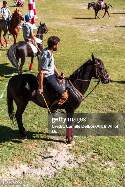 Polo players waiting the start of the game on Mai 25, 2016 in Chitral, Khyber Pakhtunkhwa, Pakistan.