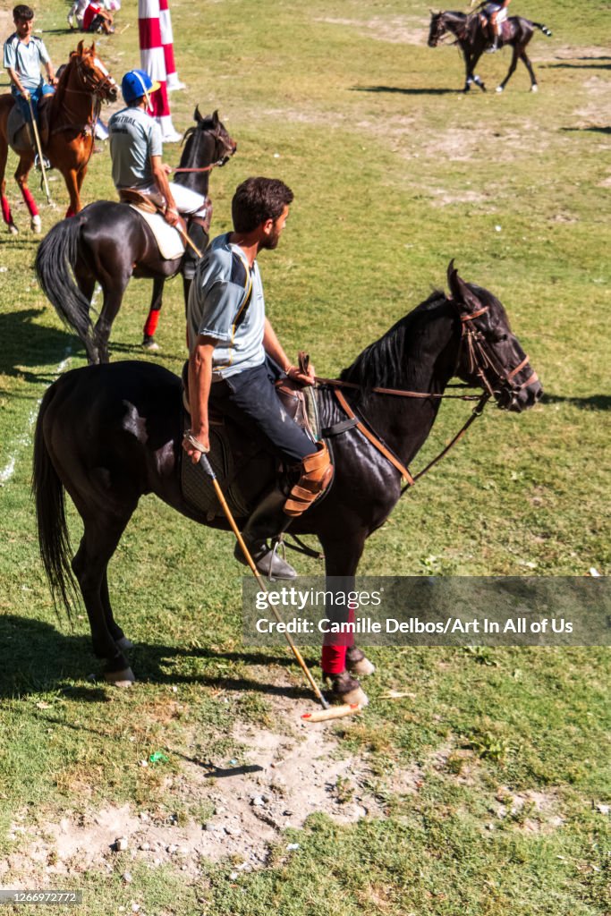 Polo players waiting the start of the game, Chitral, Khyber Pakhtunkhwa, Pakistan