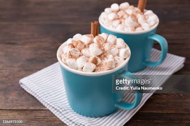 cocoa with marshmallows on brown wooden background. - hot chocolate foto e immagini stock