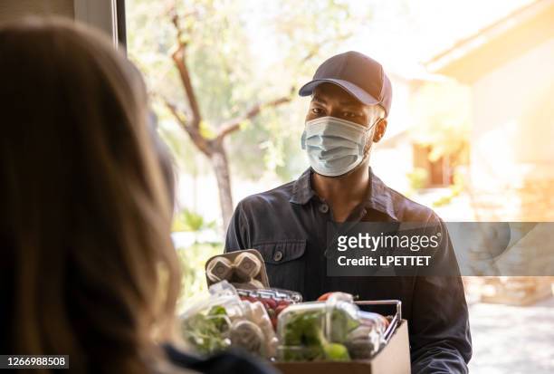 postal delivery service - food contamination stock pictures, royalty-free photos & images