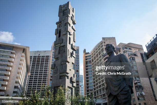 Statue of Lebanon's former prime minister Rafik al-Hariri is seen near the site of the 2005 bombing that killed him on August 18, 2020 in Beirut,...