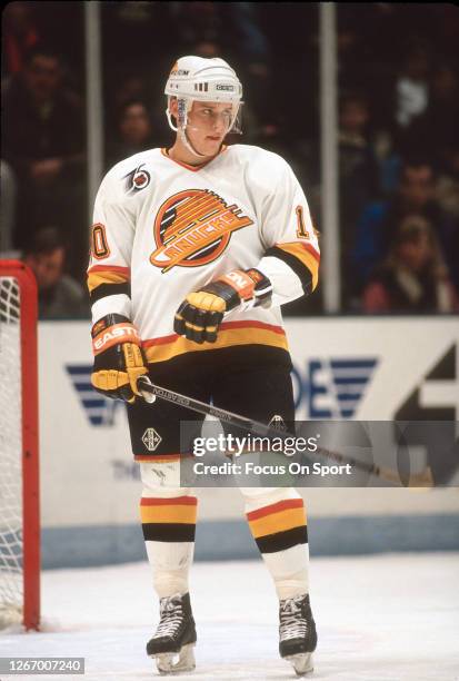 Pavel Bure of the Vancouver Canucks looks on against the New Jersey Devils during an NHL Hockey game circa 1991 at the Pacifica Coliseum in...