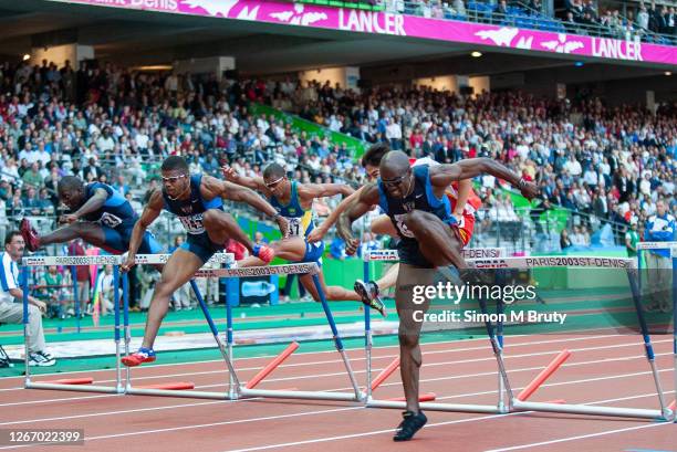 Allen Johnson of the United States of America during the final of the men's 110m hurdles at The 9th IAAF World Athletics Championships at the Stade...