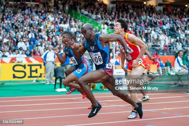 Allen Johnson of the United States of America winning the final of the men's 110m hurdles followed by Terrence Trammell of the United States of...