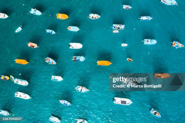 boats on blue water. overhead view. madeira, portugal - sea club ストックフォトと画像