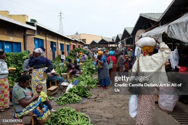 Local people buying fruit and vegetable in an organised market on Septembre 19, 2018 in Ruhengeri, Northern Province, Rwanda.