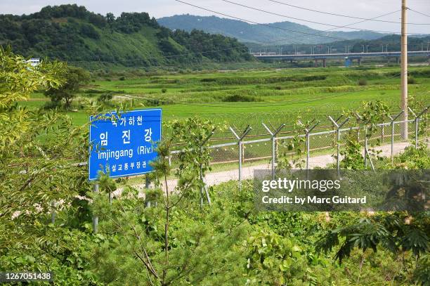 looking across the border to north korea, korean demilitarized zone, south korea - dmz stock pictures, royalty-free photos & images