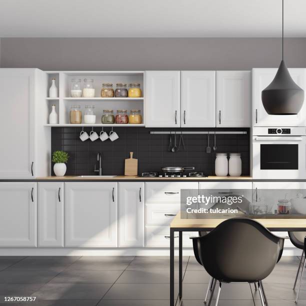 modern scandinavian kitchen and dining room with matte white traditional design cabinets - matte finish stock pictures, royalty-free photos & images