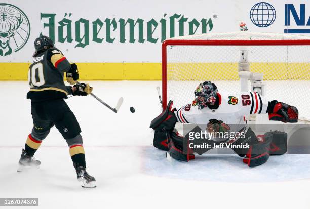 Chandler Stephenson of the Vegas Golden Knights is stopped by Corey Crawford of the Chicago Blackhawks during the second period in Game Five of the...
