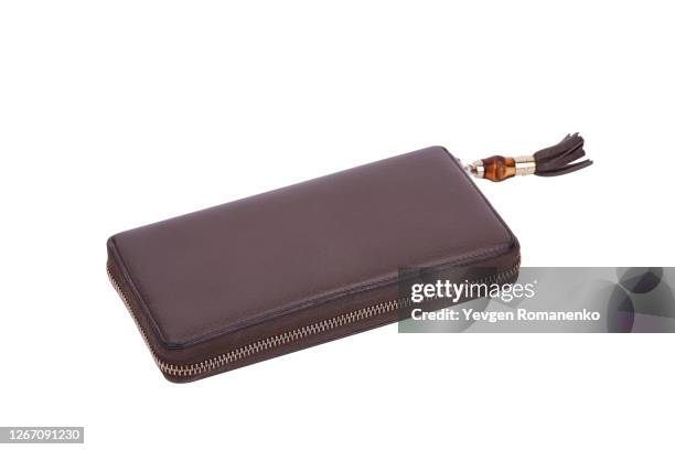 brown leather zipper wallet isolated on white background - brown purse stock-fotos und bilder