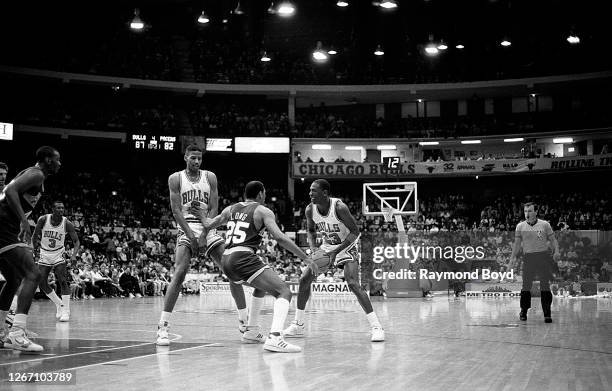 Chicago Bulls guard Michael Jordan contemplates his next move during a game against the Indiana Pacers at Chicago Stadium in Chicago, Illinois in...