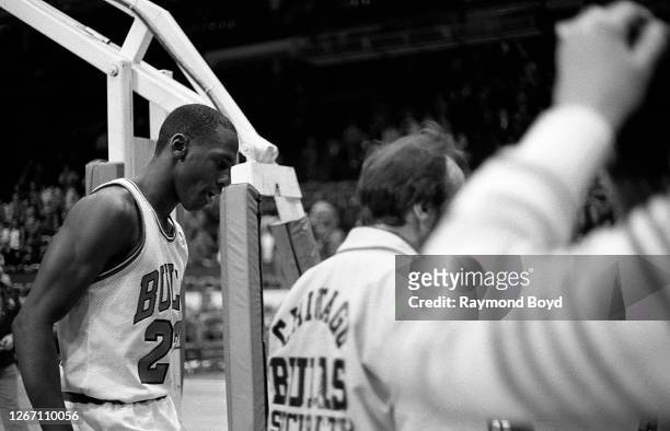 Chicago Bulls guard Michael Jordan walks off the court after a victory against the New Jersey Nets at Chicago Stadium in Chicago, Illinois in January...