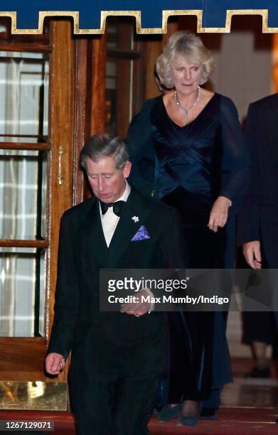 Prince Charles, Prince of Wales and Camilla Parker Bowles depart the Ritz Hotel after attending a party to celebrate Queen Elizabeth II's Golden...