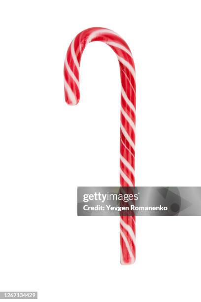 close up of candy cane isolated on white background - candy cane stock-fotos und bilder