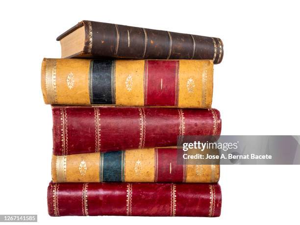 pile of old books on a white background. - textbook stack stock pictures, royalty-free photos & images