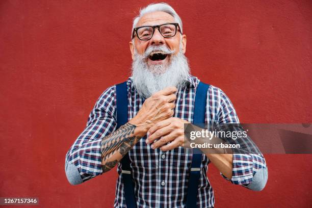 handsome senior man handlebar beard - handlebar moustache stock pictures, royalty-free photos & images
