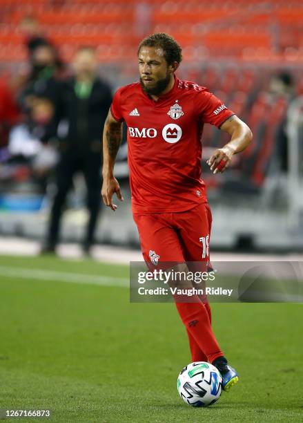 Nick DeLeon of Toronto FC dribbles the ball during an MLS game against Vancouver Whitecaps FC at BMO Field on August 18, 2020 in Toronto, Canada.