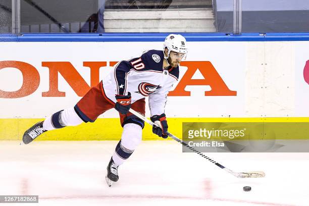 Alexander Wennberg of the Columbus Blue Jackets attempts a pass against the Tampa Bay Lightning during the second period in Game Five of the Eastern...