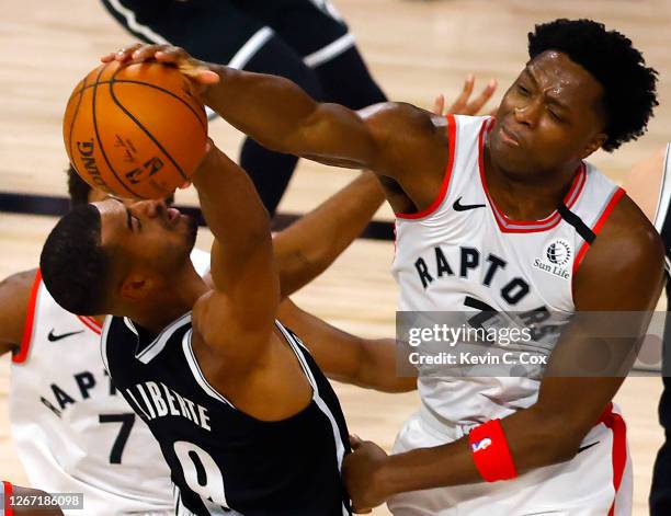 Anunoby of the Toronto Raptors blocks a shot attempt by Timothe Luwawu-Cabarrot of the Brooklyn Nets during the first quarter in Game Two of the...