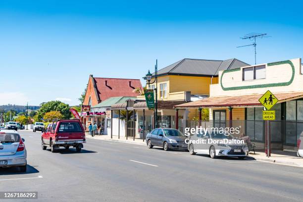 the street view of sheffield town in tasmania, australia - sheffield cityscape stock pictures, royalty-free photos & images