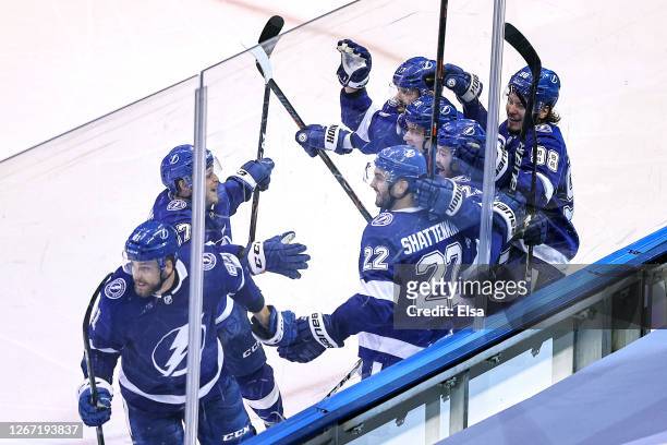 The Tampa Bay Lightning celebrate after Brayden Point scored the game winning goal against the Columbus Blue Jackets at 5:12 during the first...