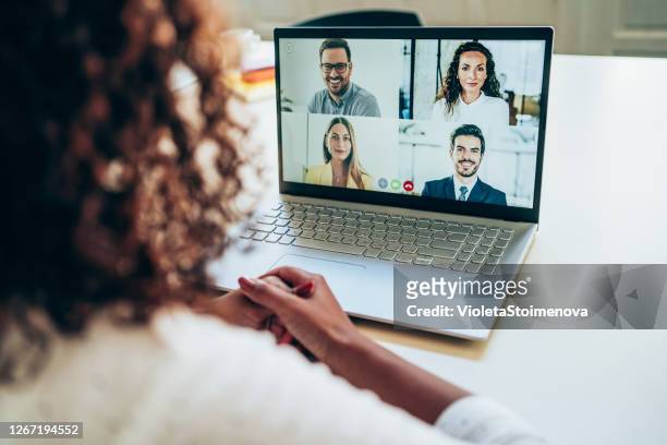business team in video conference - internet stock pictures, royalty-free photos & images