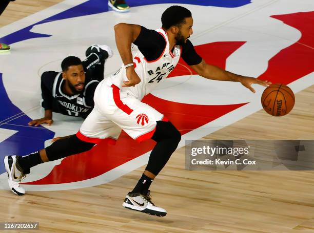 Fred VanVleet of the Toronto Raptors steals the ball from Garrett Temple of the Brooklyn Nets during the fourth quarter in Game Two of the Eastern...