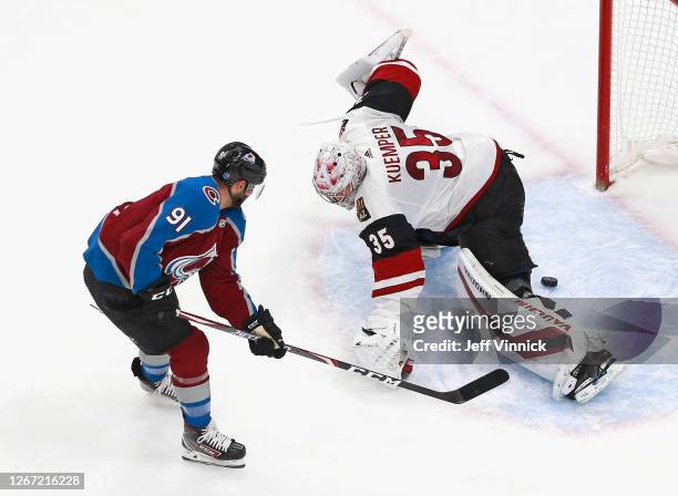 Nazem Kadri of the Colorado Avalanche scores his second goal of the first period against Darcy Kuemper of the Arizona Coyotes at 18:32 of the first...